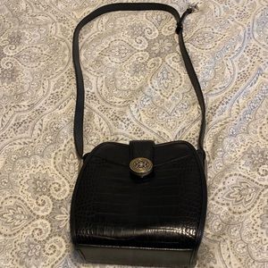 Women’s black Brighton bag.